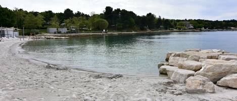Beach nearby, sun loungers