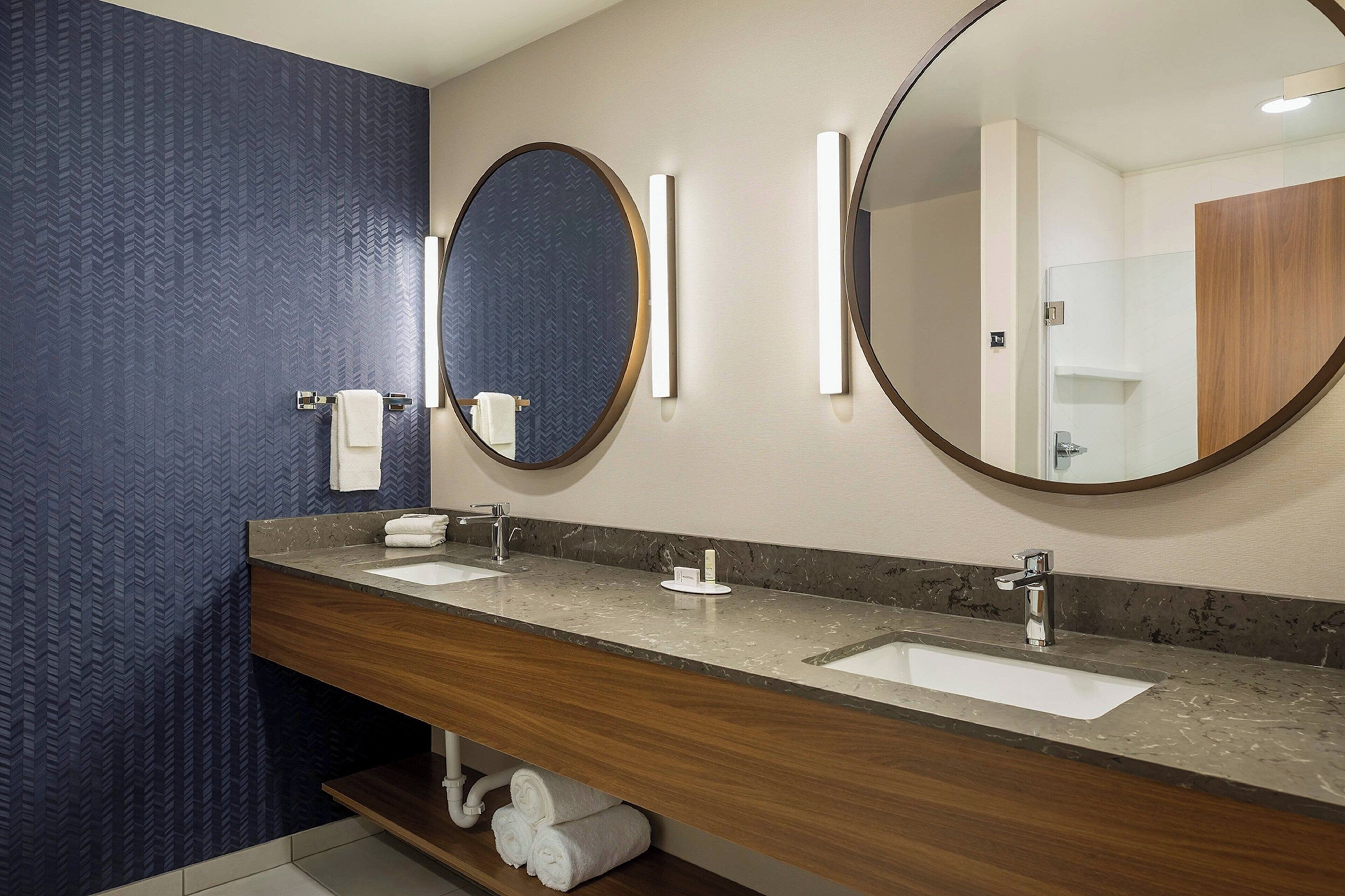 hair dryer, towels, soap, shampoo