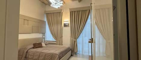 Double Room, Multiple Beds, Mountain View | Minibar, in-room safe, soundproofing, free WiFi
