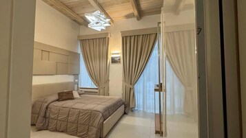 Double Room, Multiple Beds, Mountain View | Minibar, in-room safe, soundproofing, free WiFi