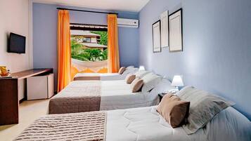 Frigobar, cortinas blackout, Wi-Fi de cortesia, roupa de cama