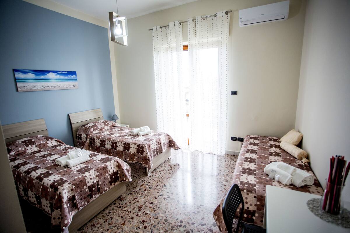 Triple Room, Shared Bathroom | Minibar, desk, laptop workspace, soundproofing