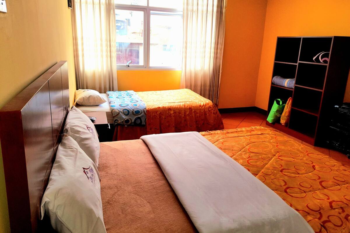 Family Room, 1 Bedroom | 3 bedrooms, down comforters, desk, free WiFi