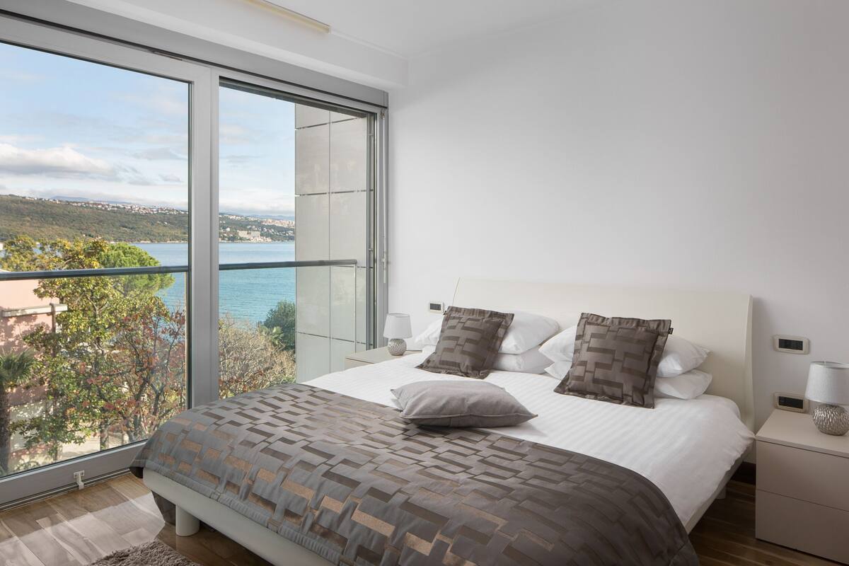 Deluxe Apartment, 1 Bedroom, Sea View, Beachfront | 2 bedrooms, blackout curtains, soundproofing, iron/ironing board