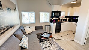 TV, fireplace, books
