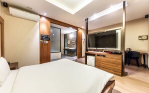 Habitación Deluxe doble | Decoración individual, mobiliario individual, cortinas opacas