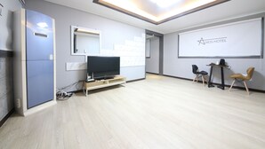 Room, Kitchenette (Condominium) | Living room | Flat-screen TV - Adios Hotel (Tongyeong)