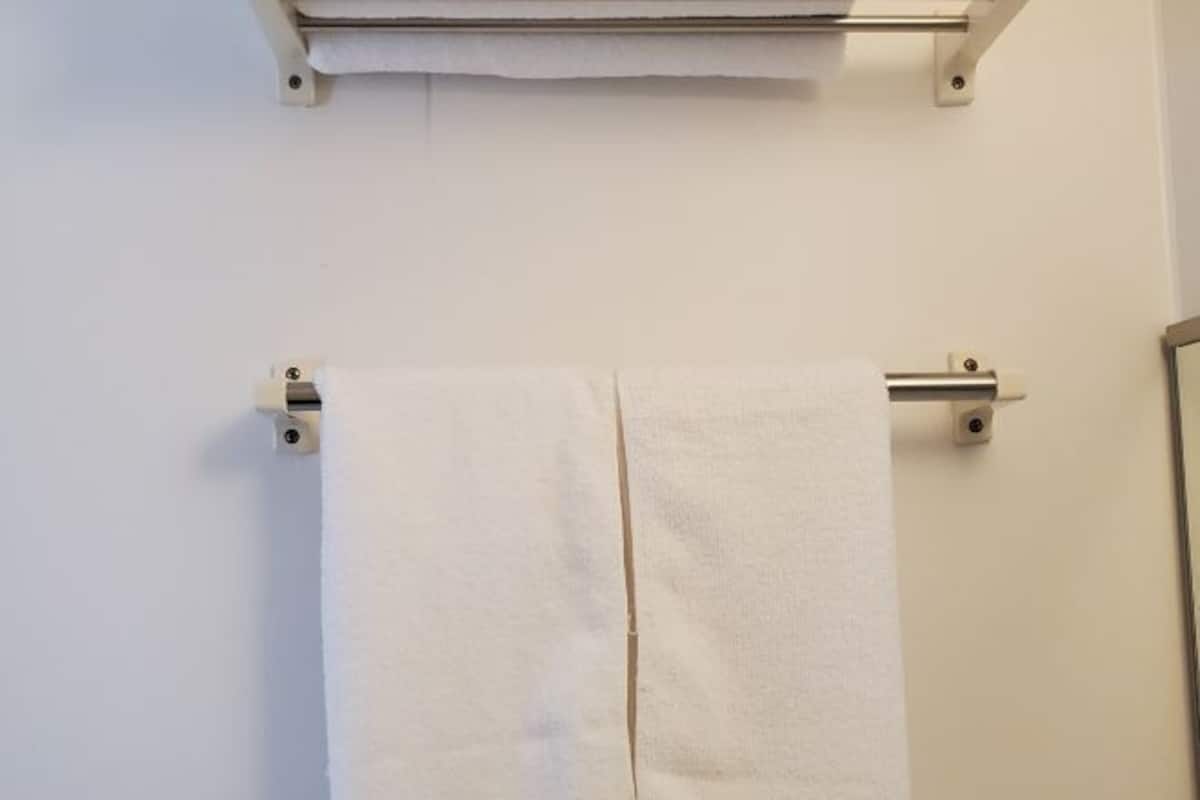 Down comforters, desk, blackout drapes, iron/ironing board