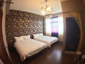 Desk, blackout curtains, free WiFi, bed sheets
