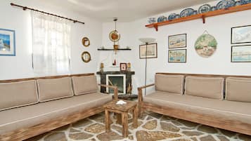 Älytelevisio, takka, kirjoja