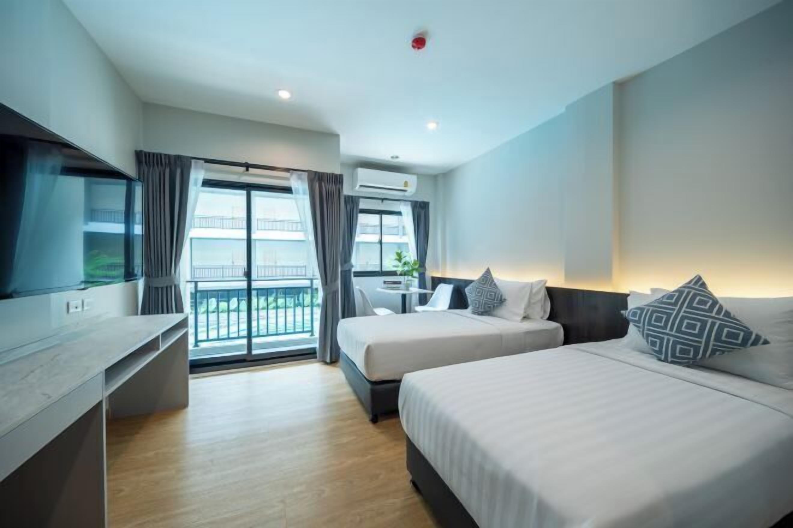 Desk, laptop workspace, free WiFi, bed sheets