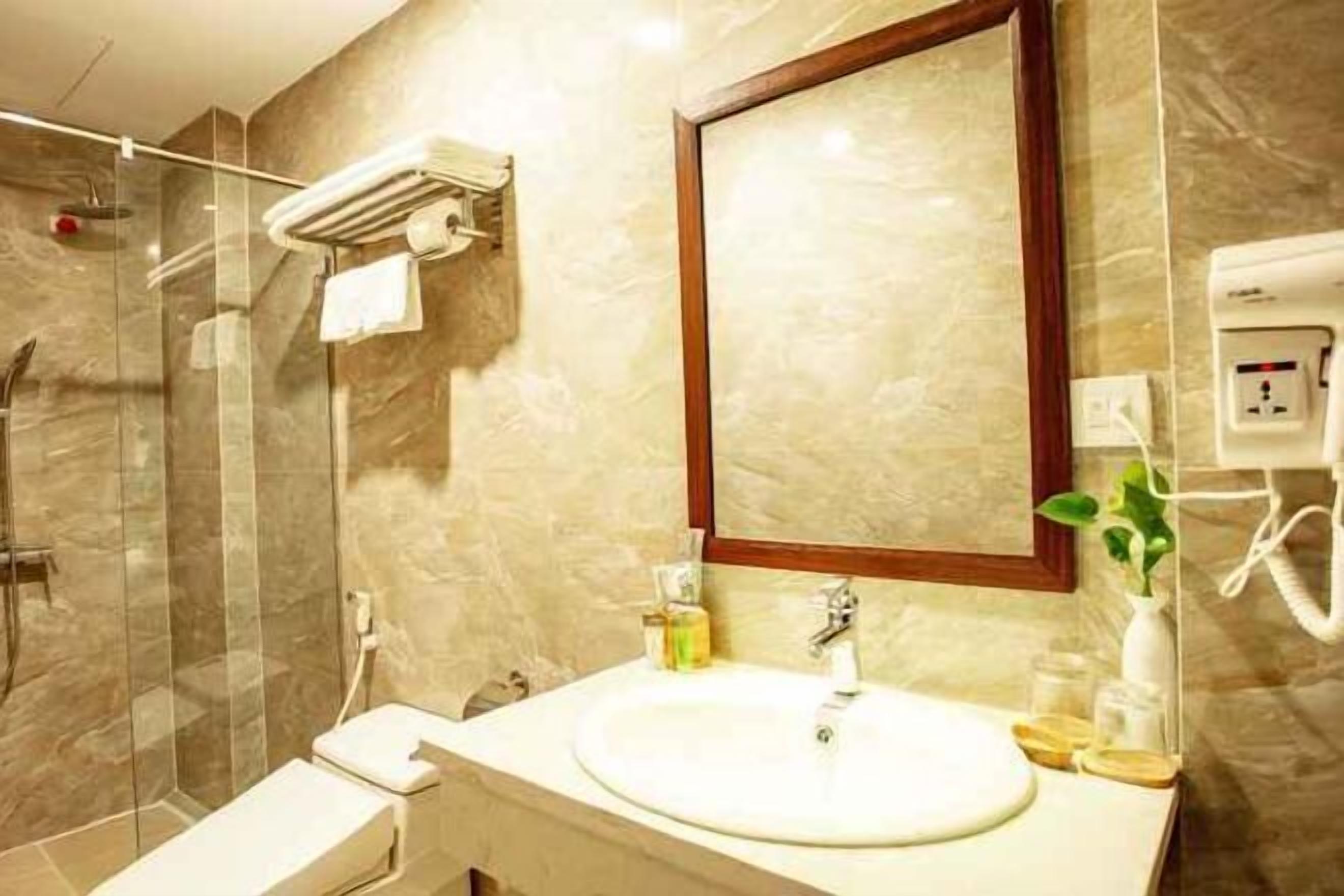 Bathroom | Shower, free toiletries, hair dryer, slippers