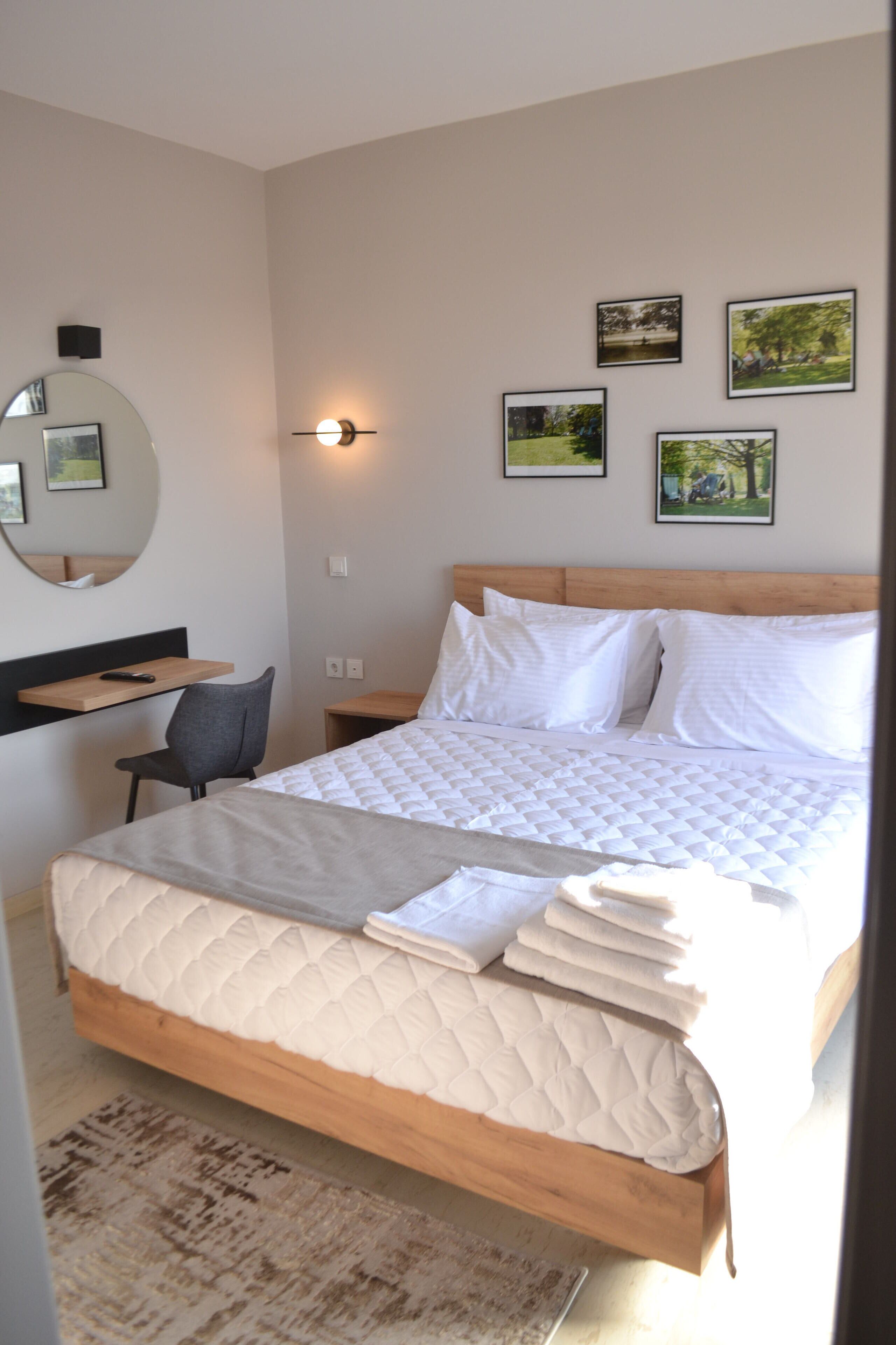 standard double room | in-room safe, desk, laptop workspace, blackout curtains