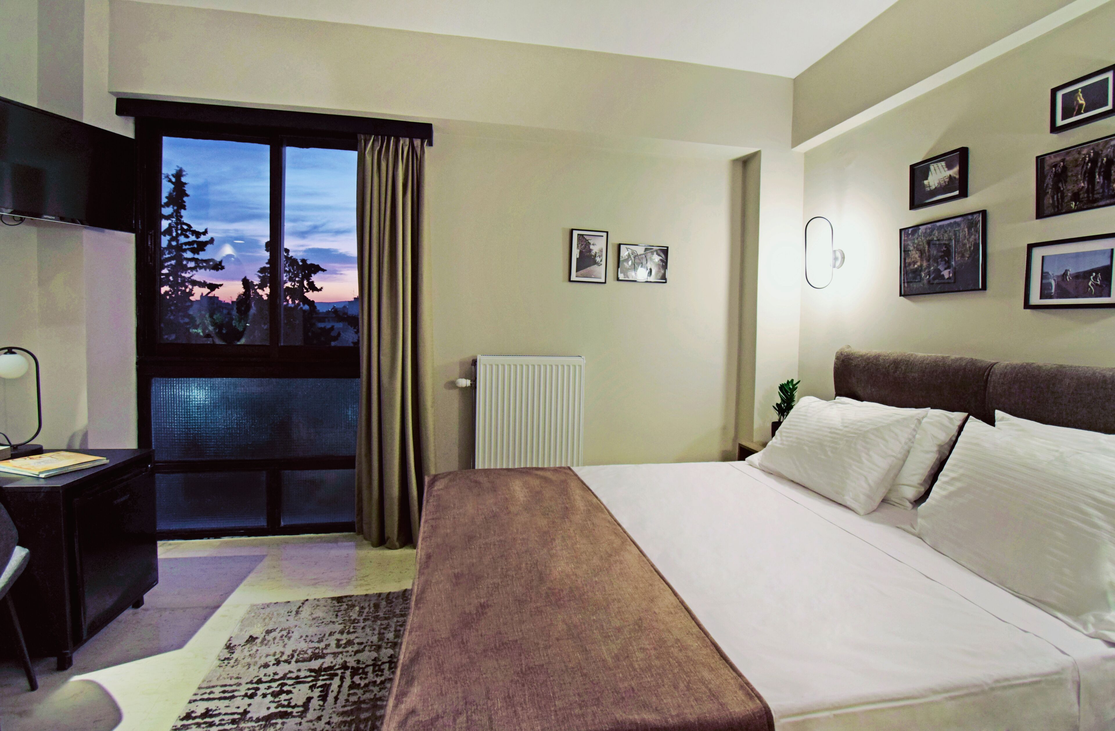 deluxe double room | in-room safe, desk, laptop workspace, blackout curtains