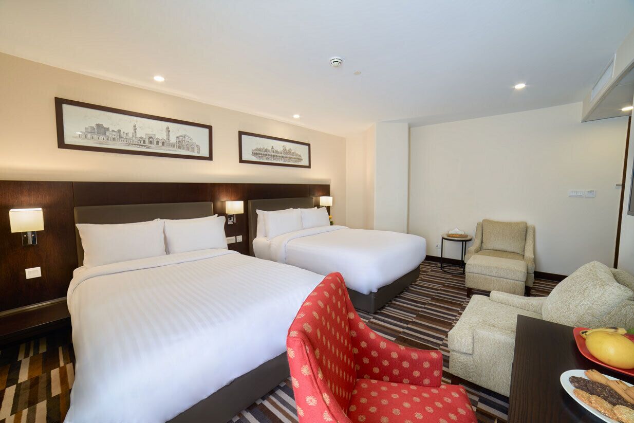 deluxe twin room | in-room safe, desk, blackout curtains, soundproofing