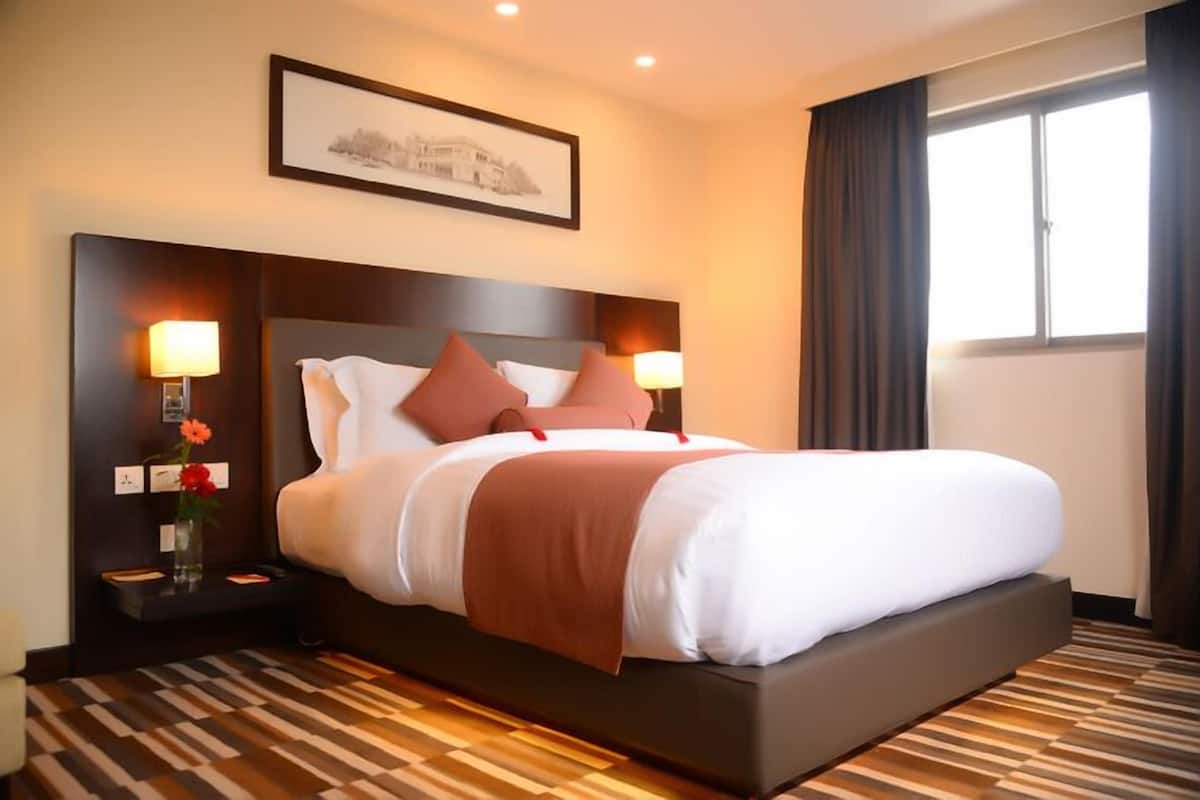 superior king room | in-room safe, desk, blackout curtains, soundproofing