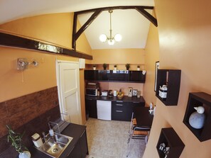 Fridge, microwave, stovetop, coffee/tea maker