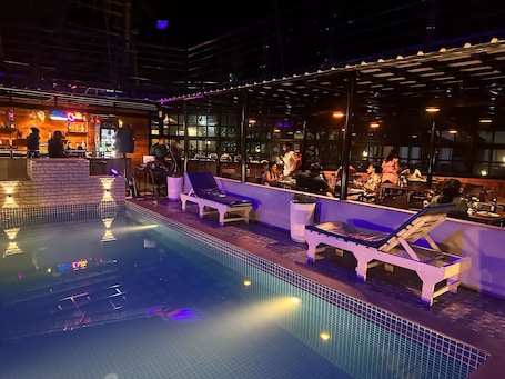 Outdoor pool, open 8:00 AM to 7:00 PM, sun loungers