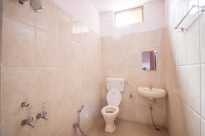 Shower, free toiletries, slippers, towels