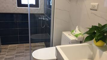 Shower, free toiletries, hair dryer, slippers