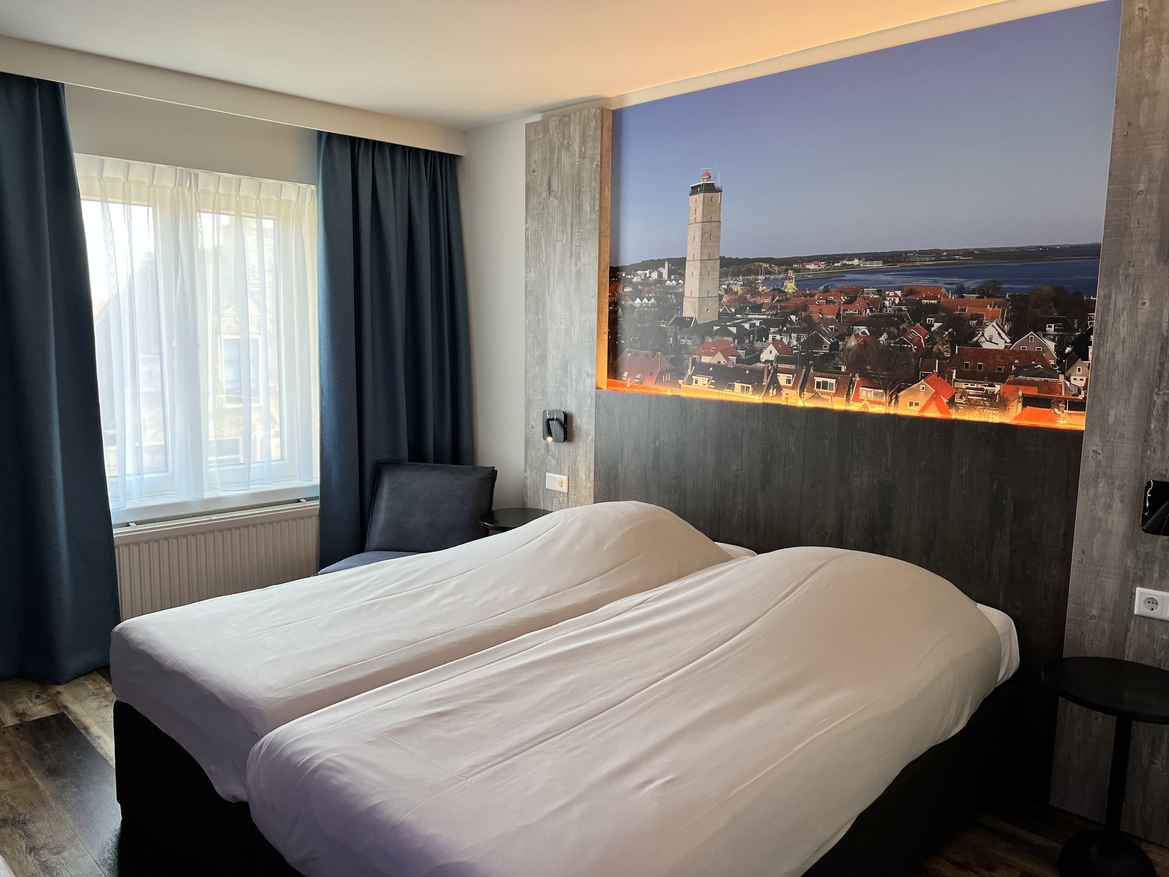 double or twin room, city view | desk, laptop workspace, blackout curtains, cots/infant beds