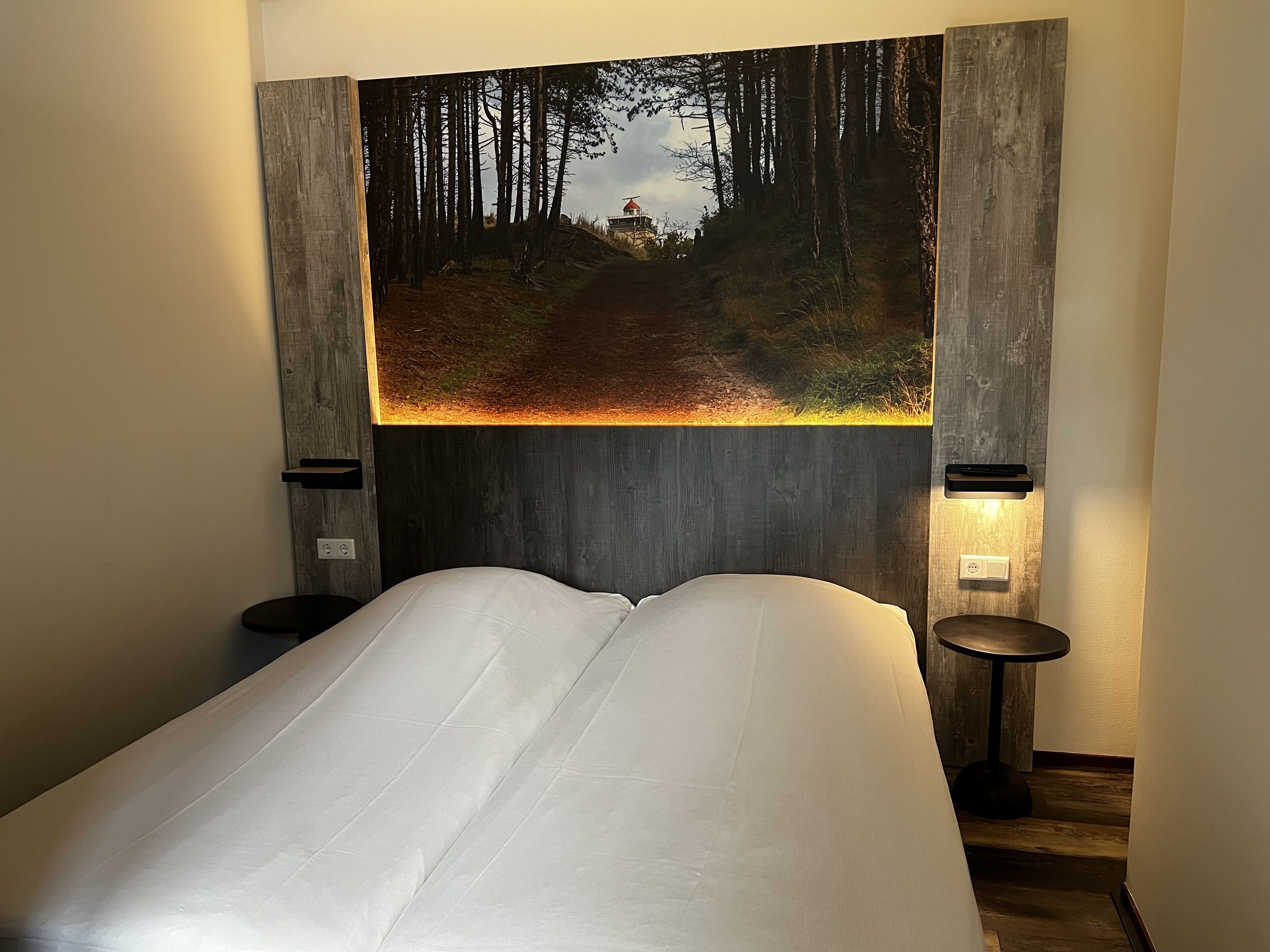 family apartment | desk, laptop workspace, blackout curtains, cots/infant beds