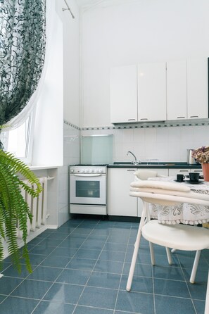 Fridge, microwave, cookware/dishes/utensils, spices