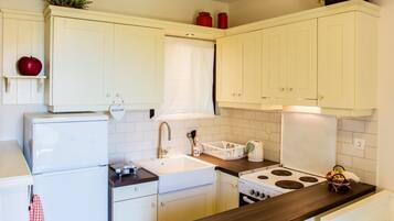 Apartment, Garden View, Ground Floor (The Garden) | Private kitchen | Full-sized fridge, oven, stovetop, coffee/tea maker