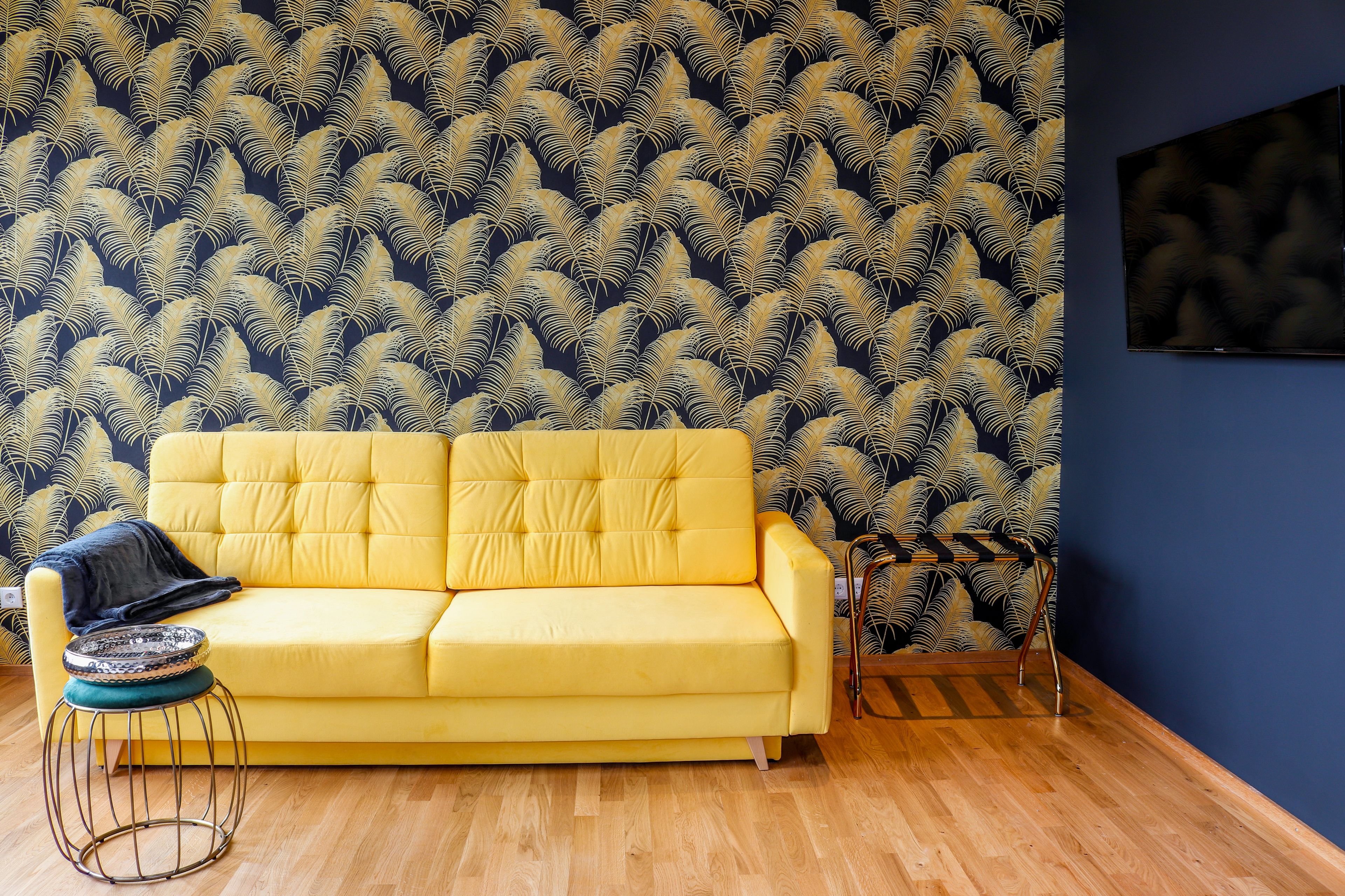 deluxe quadruple room | living area | 43-inch smart tv with satellite channels, tv, netflix