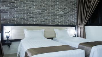 Departamento Premier, 2 camas individuales | 1 habitación, minibar, insonorización y tabla de planchar con plancha