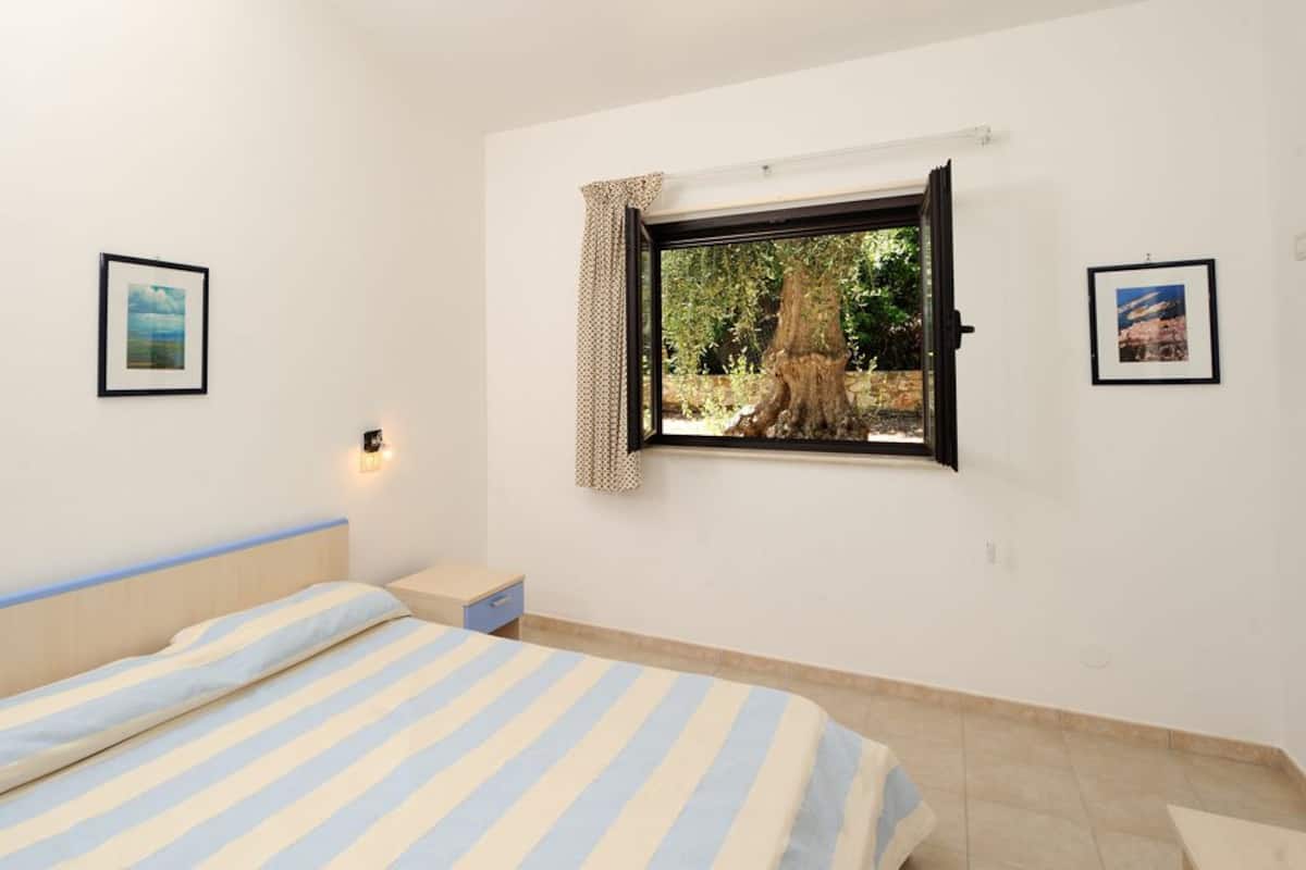 Trilocale Superior | 1 bedroom, in-room safe, blackout drapes, cribs/infant beds
