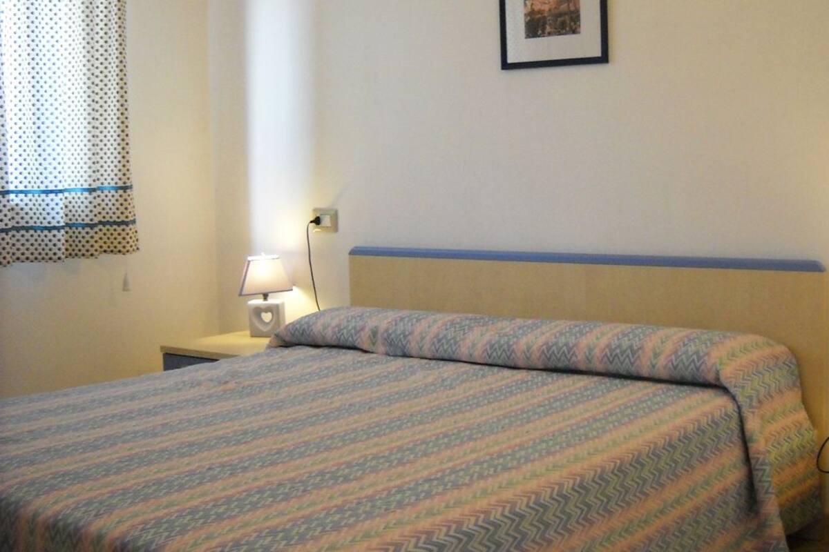 Bilocale Standard | 1 bedroom, in-room safe, blackout drapes, cribs/infant beds