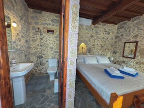 Bathtub, hair dryer, towels, soap