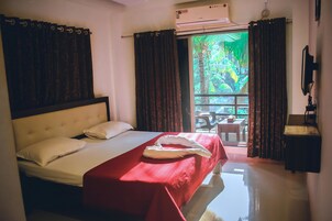 豪華客房, 1 張特大雙人床, 花園景 | 免費 Wi-Fi、床單