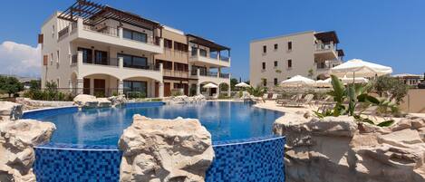 Outdoor pool, pool umbrellas, pool loungers