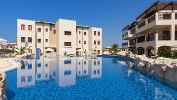 Outdoor pool, pool umbrellas, pool loungers