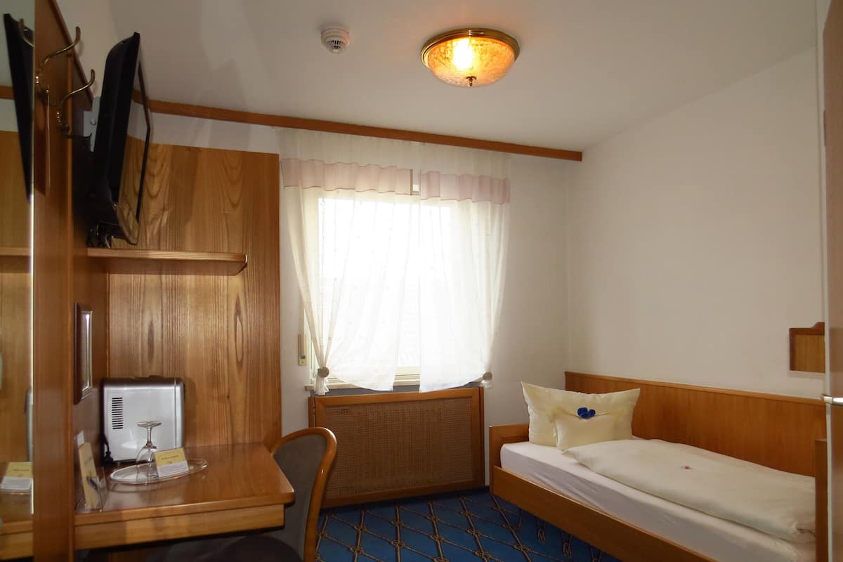 Habitación individual estándar | Ropa de cama hipoalergénica y caja de seguridad en la habitación 