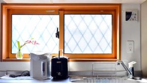 A kitchen with a window, a kettle, a small appliance, and a sink. - 2 min. to Asakusa line - Quiet area (大田区)