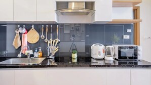 Apartment, 2 Bedrooms, City View | Shared kitchen | Fridge, microwave, electric kettle, rice cooker - Bayhomes Serviced Apartment at Muong Thanh Residence (Da Nang)