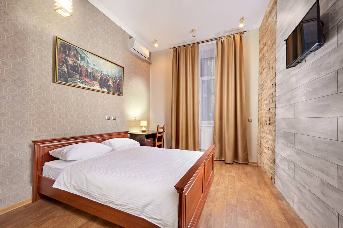 Economy Double Room, Shared Bathroom (A) | Iron/ironing board, free WiFi, bed sheets