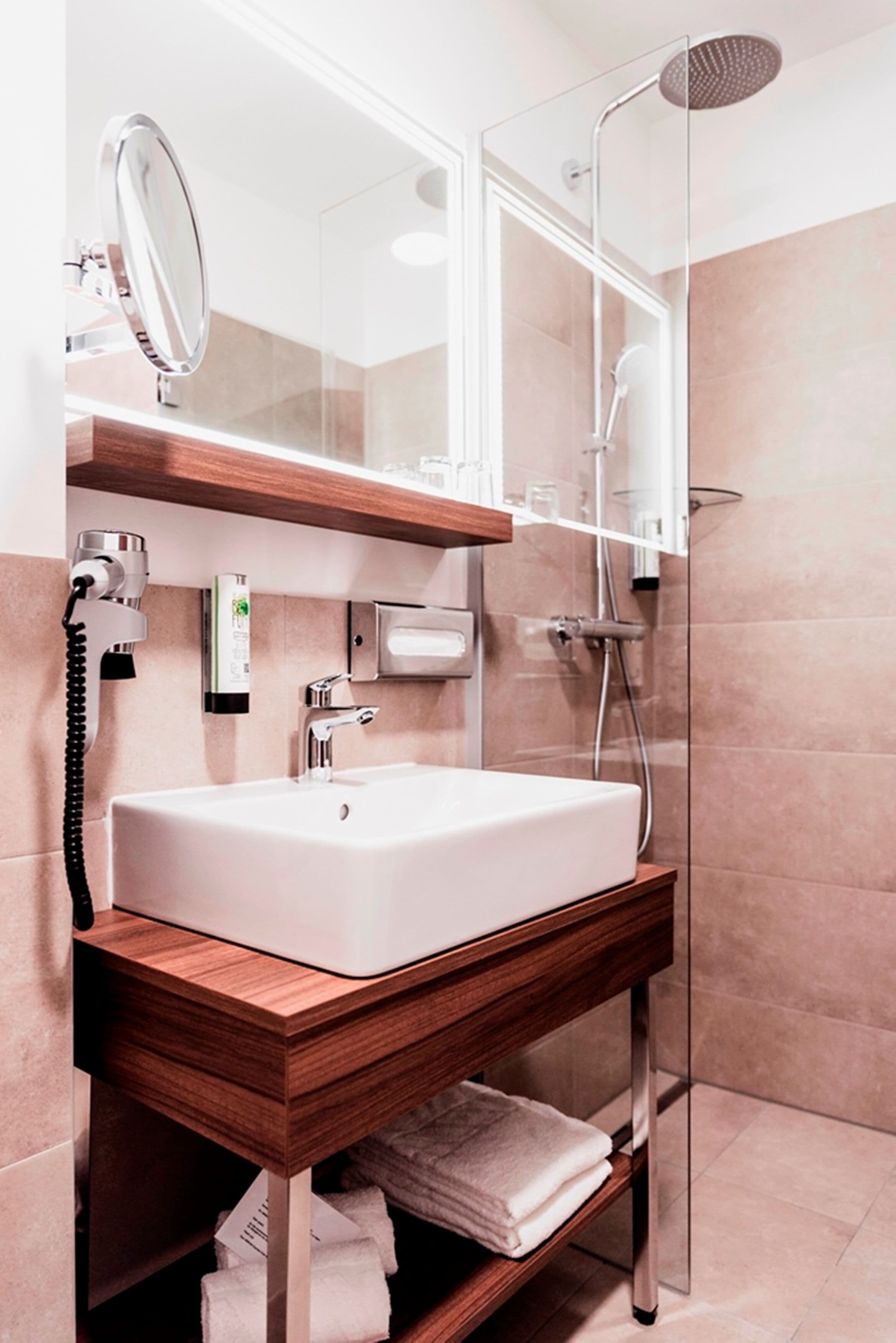 shower, free toiletries, hair dryer, towels