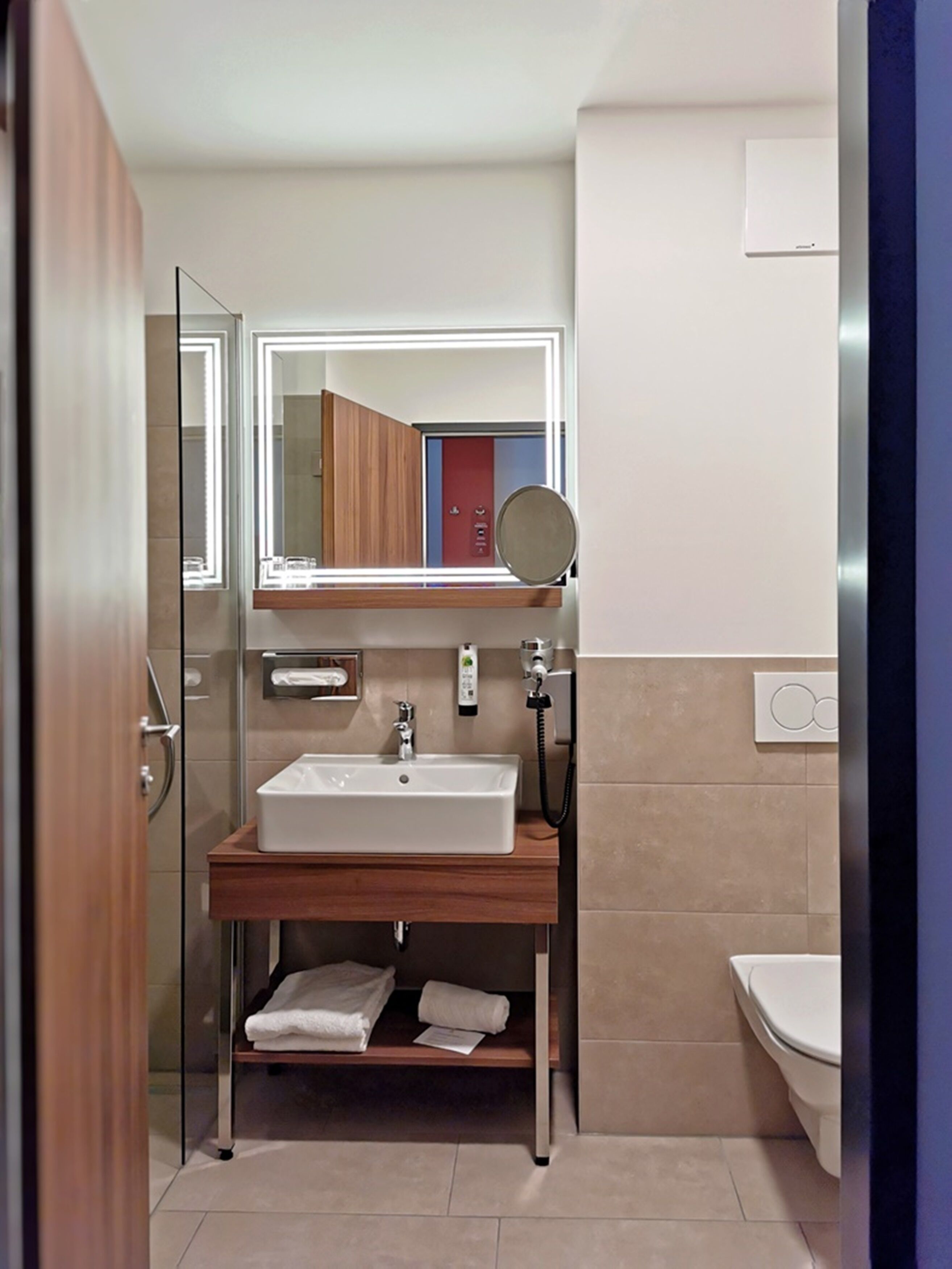 shower, free toiletries, hair dryer, towels