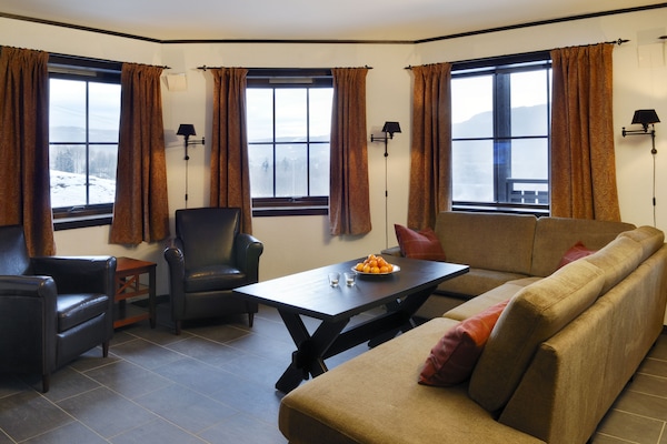 Family Apartment, 3 Bedrooms, Sauna, Slope side | Living room | Flat-screen TV, fireplace