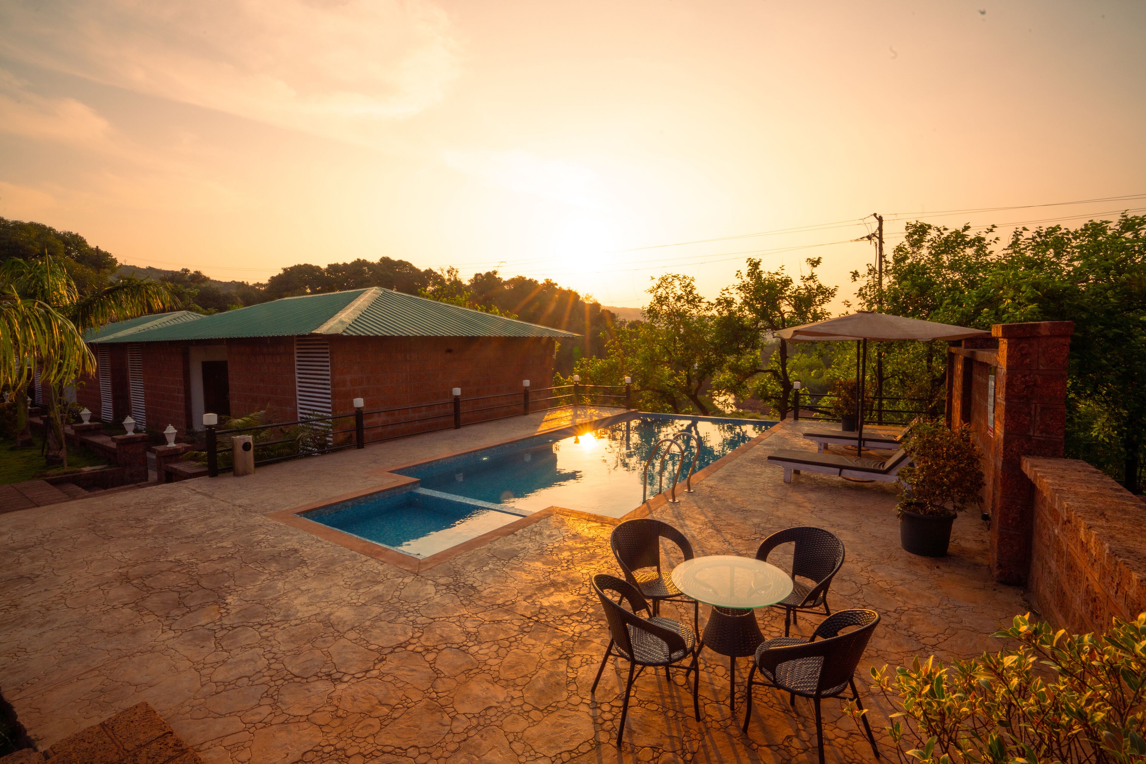 Outdoor pool, pool umbrellas, sun loungers