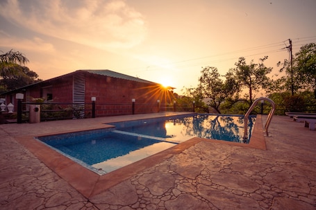 Outdoor pool, pool umbrellas, sun loungers