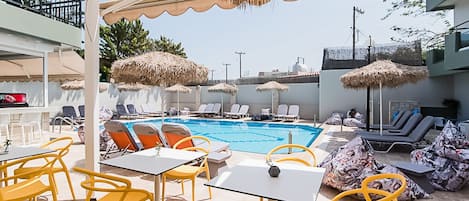 Seasonal outdoor pool, pool umbrellas, sun loungers