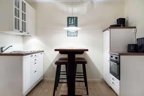 Family Apartment, 2 Bedrooms, Garden Area | Private kitchen | Full-size fridge, microwave, oven, stovetop