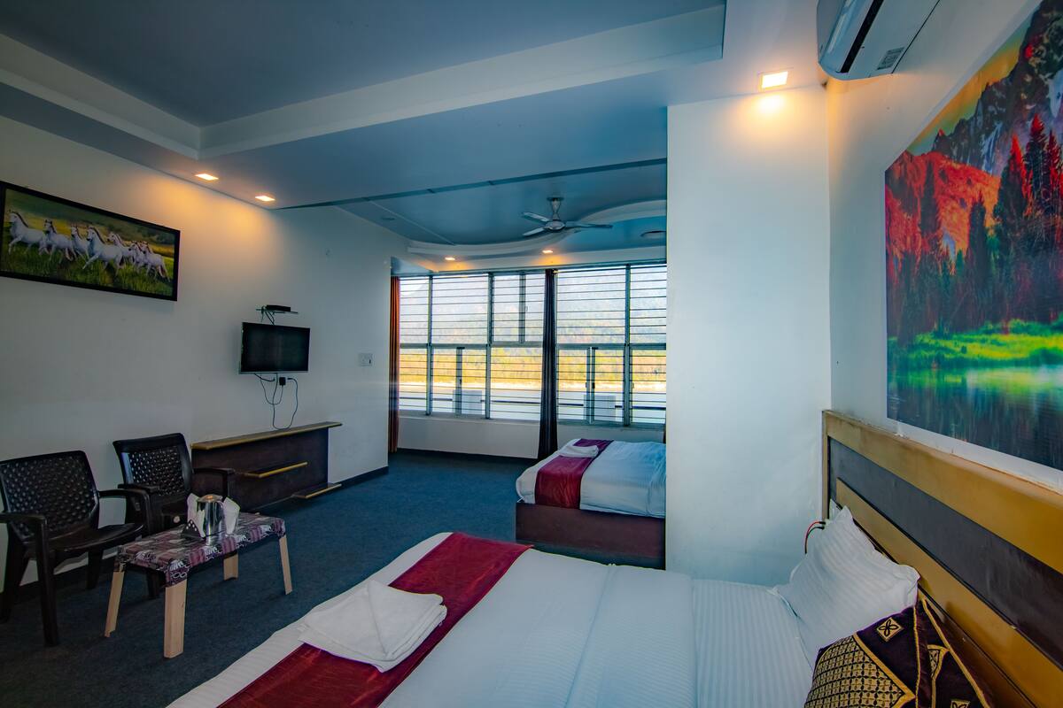 Family Room with Ganga Facing | Free WiFi