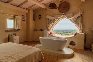 Chambre Double Junior, cheminée, vue piscine