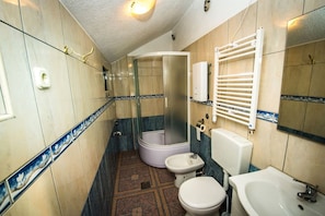 Hair dryer, bathrobes, slippers, bidet
